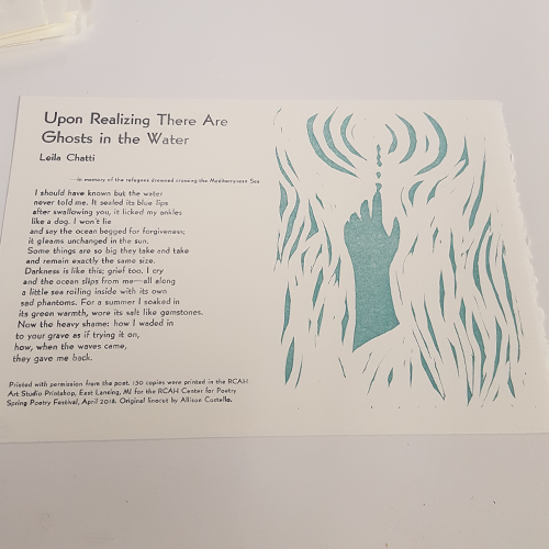 Broadside poster of a poem and linocut of a hand